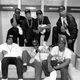 Rap group N.W.A. pose with rappers The D.O.C. and Laylaw from Above The Law (L-R standing: Laylaw, DJ Yella, Dr. Dre and The D.O.C. seated Ice Cube, Eazy-E and MC Ren)backstage at the Kemper Arena during their 'Straight Outta Compton' tour in June 1989 in Kansas City, Mo.